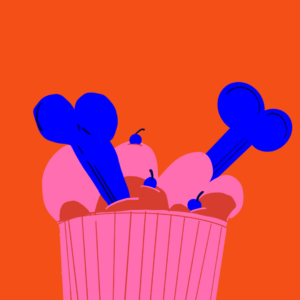 Orange grafik med en cupcake af hunde mad, tiltænkte hunde. Der er både knogler og en masse andet godt som kan f.eks. kunne finde på at putte i en kong eller en slikkemåtte