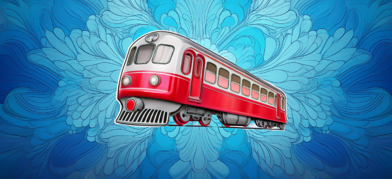 Et gammeldags rødt tog mod en blå baggrund.